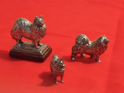 Silver: 3 Silver miniature sculptures of Pomeranien dogs