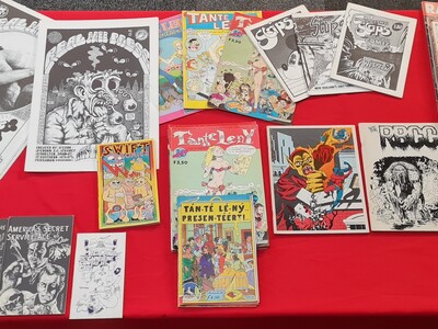 Stripboeken: Lot met 50 diverse strips en stripinfo uitgaven